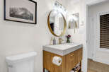 This stunning bathroom boasts a modern design with a touch of elegance.