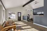 This inviting space features a bright and airy interior with a modern design.