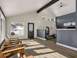 This inviting space features a bright and airy interior with a modern design.