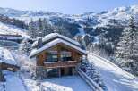 Experience the ultimate winter escape in this stunning chalet nestled in the heart of the mountains.