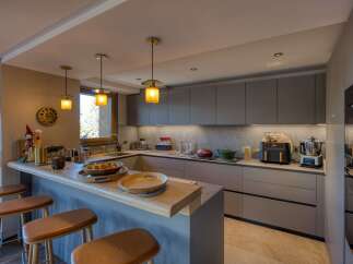 Step into a modern kitchen designed for both style and functionality.