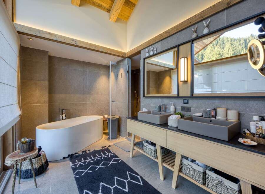 This luxurious bathroom boasts a modern design with high-end finishes.