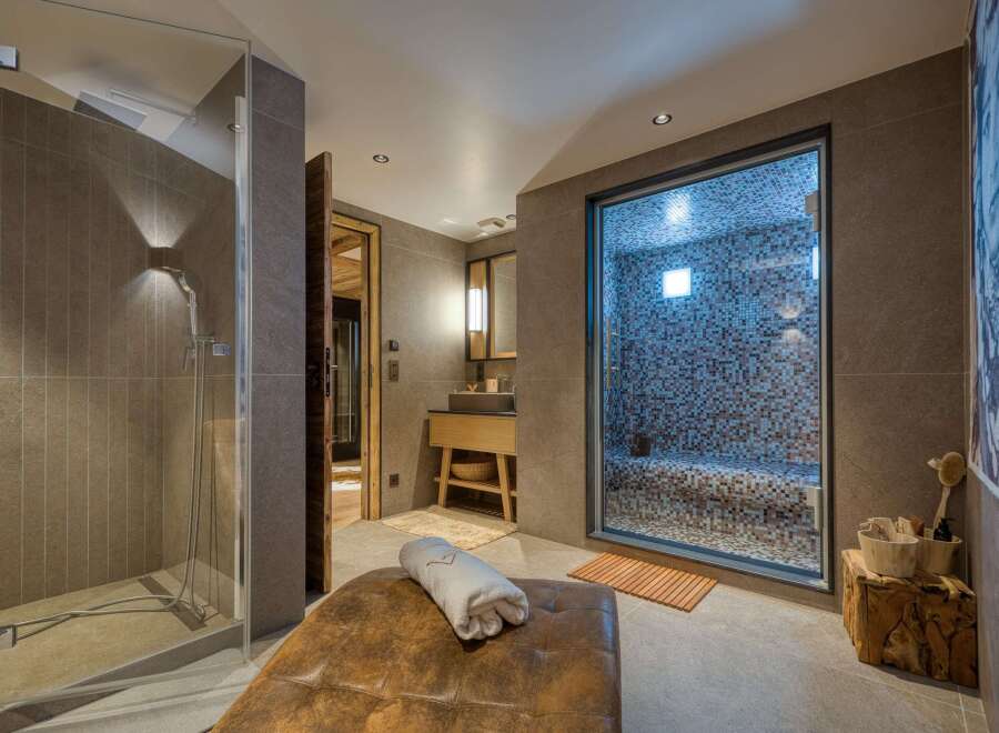 Indulge in luxury and relaxation in this stunning spa-like bathroom.