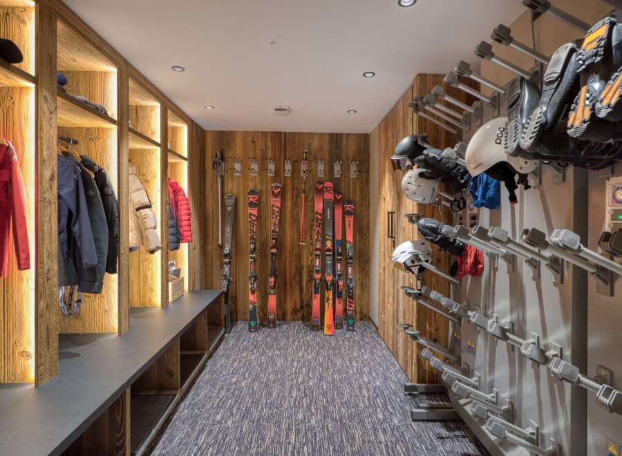 This ski storage room is the perfect addition to any luxury ski chalet.