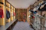 This ski storage room is the perfect addition to any luxury ski chalet.