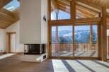 Experience the epitome of luxury living in this stunning chalet, boasting breathtaking mountain views.