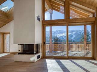 Experience the epitome of luxury living in this stunning chalet, boasting breathtaking mountain views.