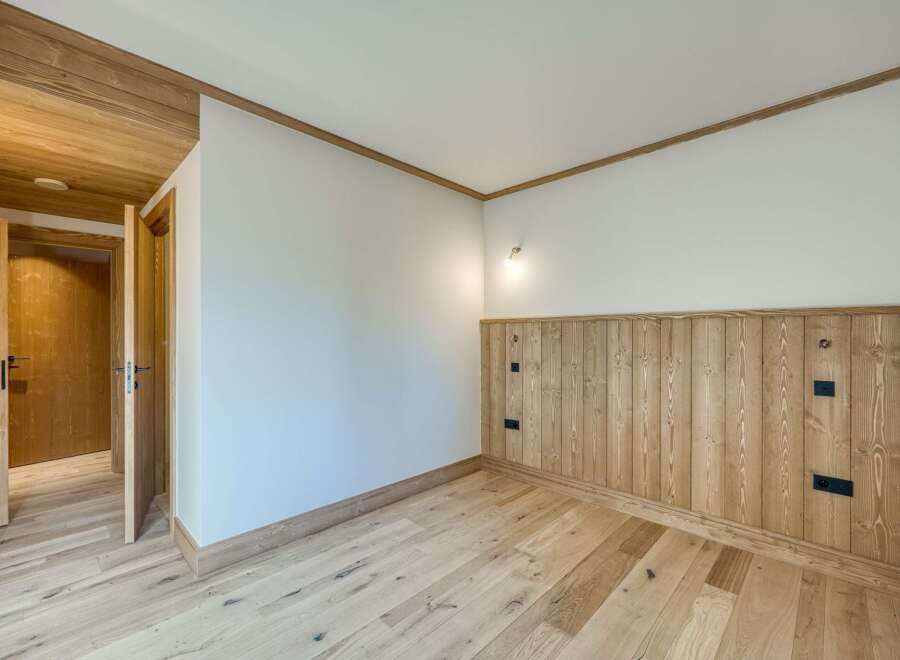 This stunning room boasts a warm and inviting atmosphere with its beautiful wooden accents.