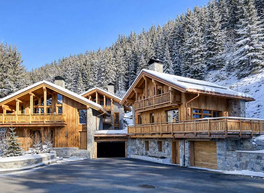 Discover the epitome of luxury living in this stunning chalet nestled in a winter wonderland.