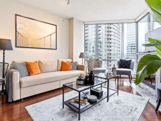 Experience luxury living in this stunning condo! This property boasts a spacious living area, perfect for entertaining or relaxing.