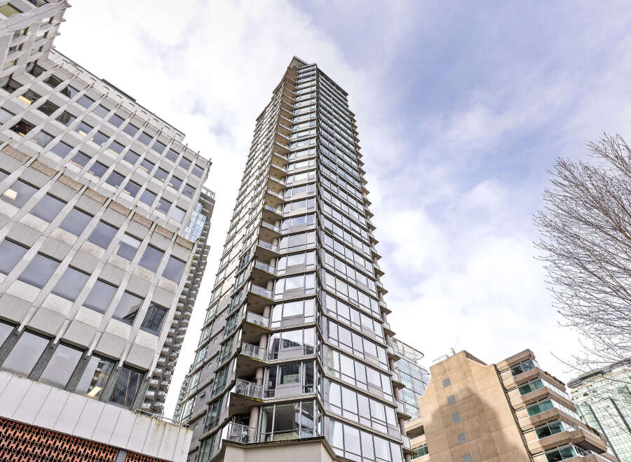 This stunning high-rise building offers a modern and luxurious living experience.