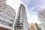 This stunning high-rise building offers a modern and luxurious living experience.