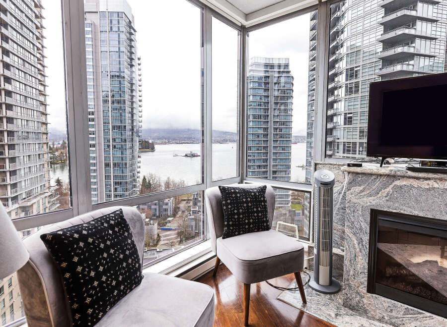 Enjoy stunning city and water views from this luxurious condo.
