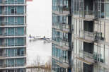 Experience luxury living with stunning waterfront views from this modern high-rise.