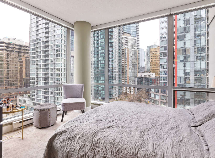 Experience luxury living in this stunning high-rise condo with breathtaking city views.