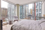 Experience luxury living in this stunning high-rise condo with breathtaking city views.