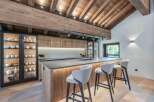 This stunning kitchen showcases a blend of rustic charm and modern design.