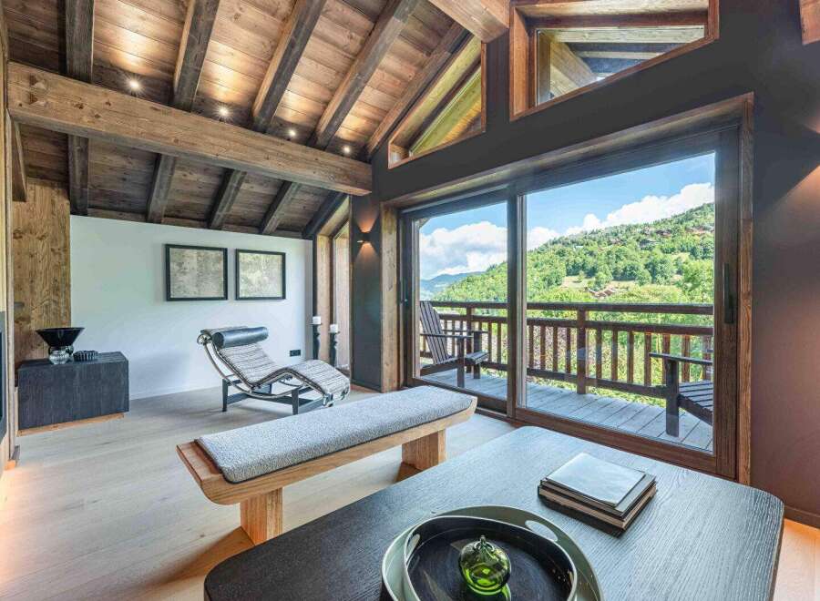 Experience the epitome of luxury living in this stunning property, boasting a beautifully designed interior with exposed wooden beams and a cozy ambiance.