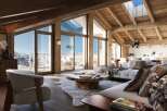Experience luxury living in this stunning chalet, boasting breathtaking mountain views.
