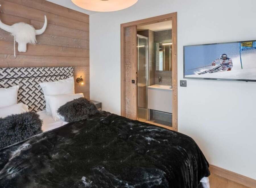 Experience luxury and comfort in this stunning bedroom.
