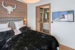 Experience luxury and comfort in this stunning bedroom.