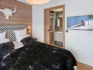 Experience luxury and comfort in this stunning bedroom.