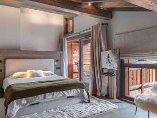 Experience luxury living in this stunning bedroom.
