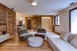 Experience luxury living in this stunning property, featuring exquisite wooden accents and a modern design.