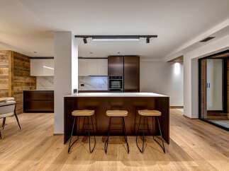 This stunning kitchen boasts a modern design with a warm, inviting feel.