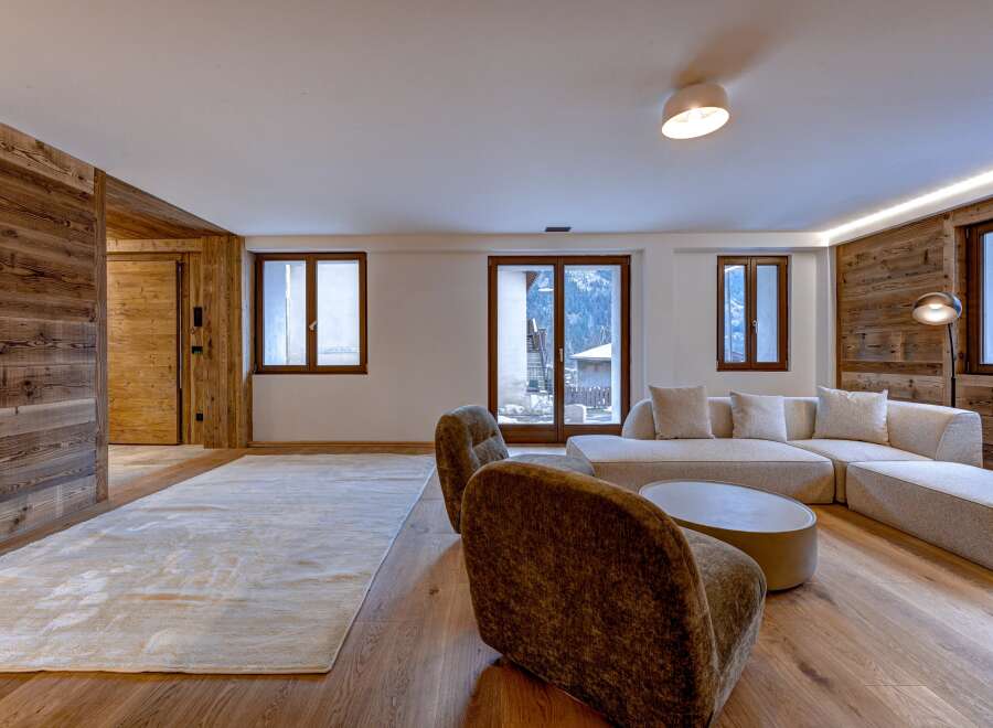Experience luxury living in this stunning property, featuring exquisite wooden accents and a modern design.