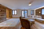 Experience luxury living in this stunning property, featuring exquisite wooden accents and a modern design.