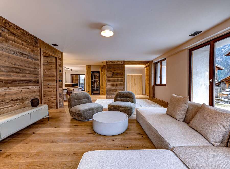 Experience luxury living in this stunning property, featuring exquisite wooden accents and a modern design.
