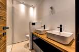 This modern bathroom features a sleek design with minimalist elements.