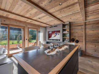 Experience the epitome of luxury living in this stunning property, featuring exquisite wooden accents throughout.