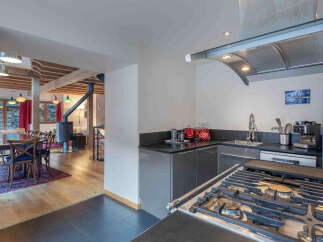This stunning property boasts a beautifully designed kitchen, perfect for culinary enthusiasts.