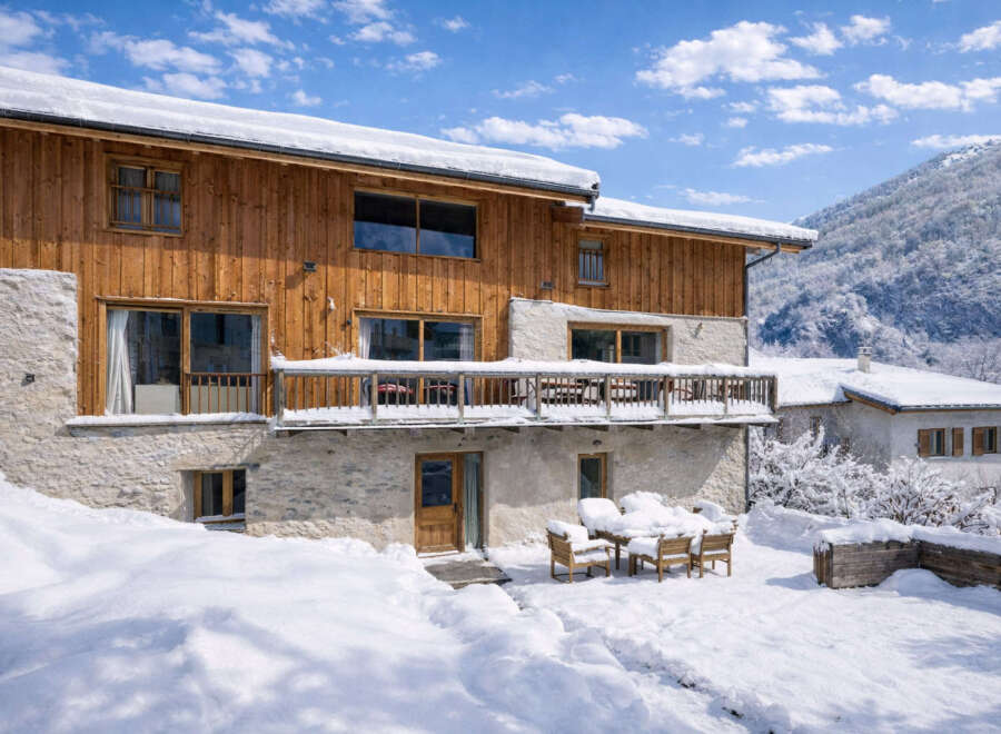 This stunning chalet offers a perfect blend of rustic charm and modern comfort, nestled in a picturesque winter wonderland.
