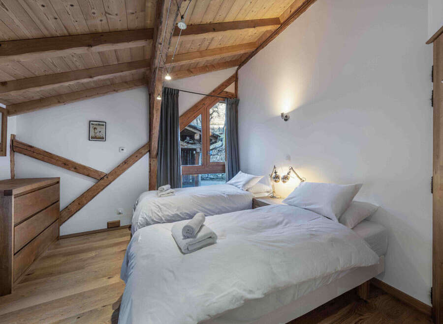 Discover the charm of this cozy bedroom, perfect for a relaxing getaway.