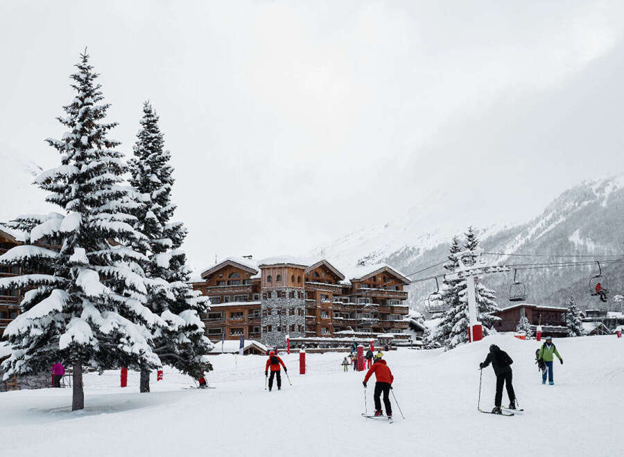 Experience the ultimate winter getaway in this stunning ski resort property! Nestled amidst snow-capped mountains, this luxurious chalet offers breathtaking views and direct access to the slopes.