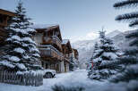 Experience the ultimate winter getaway in this stunning chalet, nestled in a picturesque snow-covered landscape.