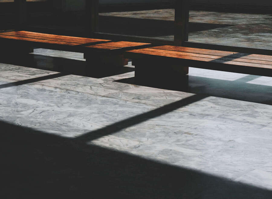 This image showcases a modern interior space, highlighting the interplay of light and shadow.