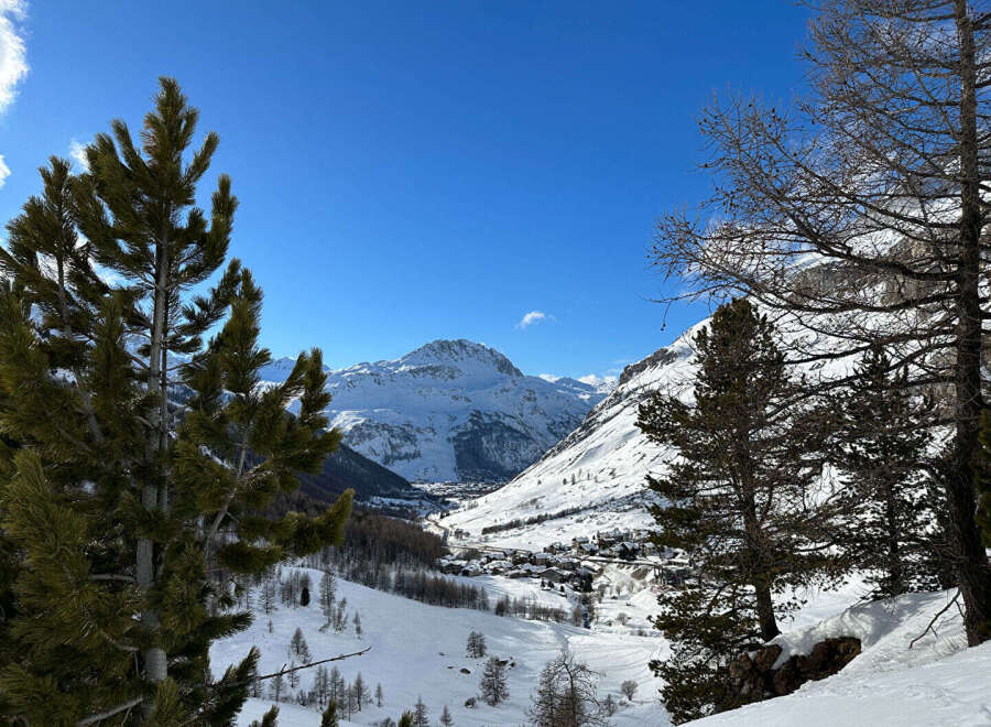 Nestled in a picturesque mountain valley, this property offers stunning views of snow-capped peaks and a charming village.