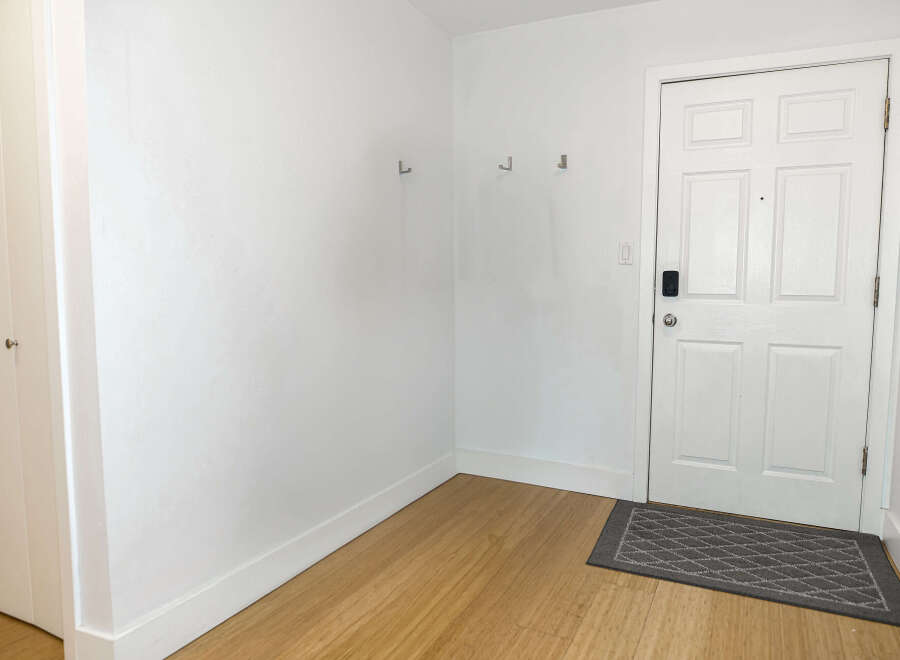 Step into a bright and inviting entryway, perfect for welcoming guests.