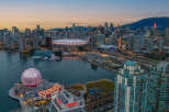 Experience the vibrant city life with stunning waterfront views in this luxurious property.