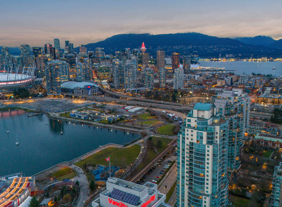 Experience the vibrant city life with this stunning aerial view of Vancouver's skyline.