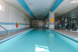 This stunning indoor pool offers a luxurious and relaxing experience.