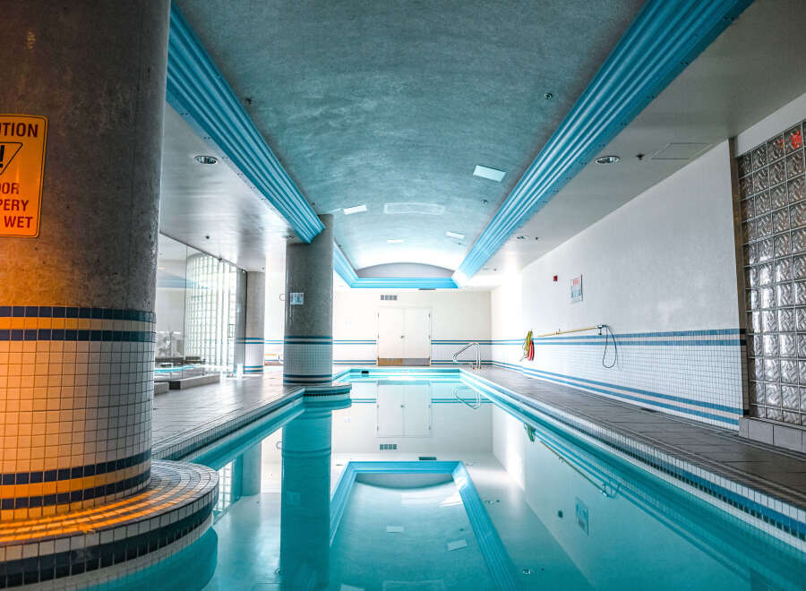 This stunning indoor pool offers a serene and inviting atmosphere, perfect for relaxation and exercise.