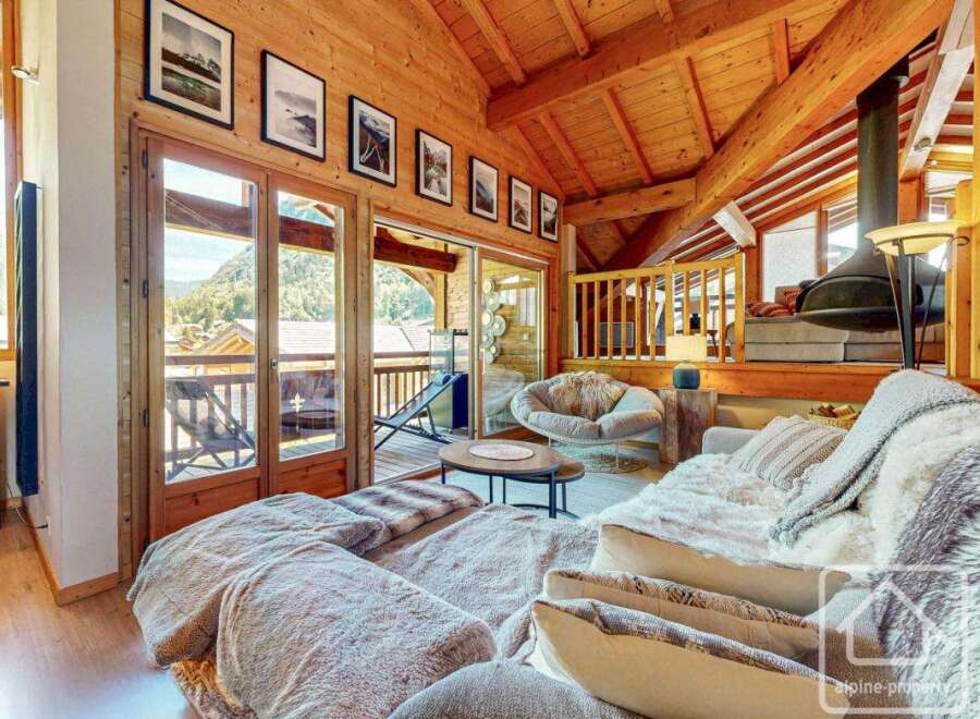 Experience the epitome of alpine luxury in this stunning property, boasting exquisite wooden interiors and breathtaking mountain views.