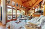 Experience the epitome of alpine luxury in this stunning property, boasting exquisite wooden interiors and breathtaking mountain views.