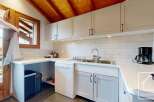 Discover the charm of this well-equipped kitchen, perfect for preparing delicious meals.