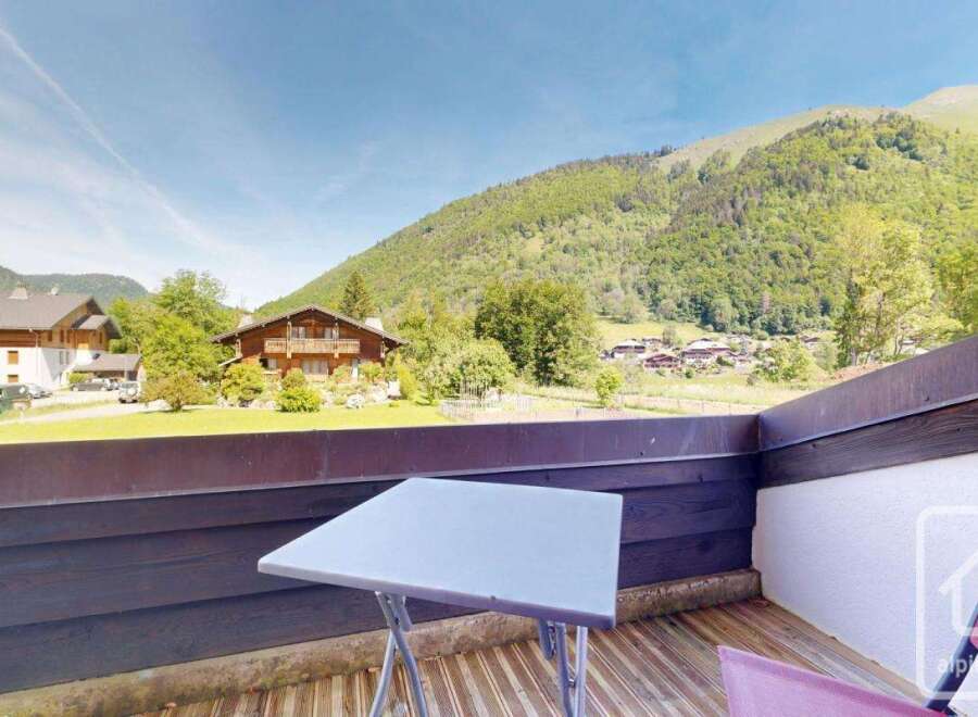 Enjoy breathtaking mountain views from this charming property.